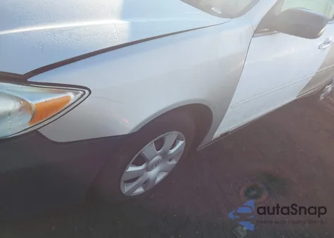 2003 Toyota Camry Le z USA, uszkodzony, nr VIN 4T1BE32K33U183543